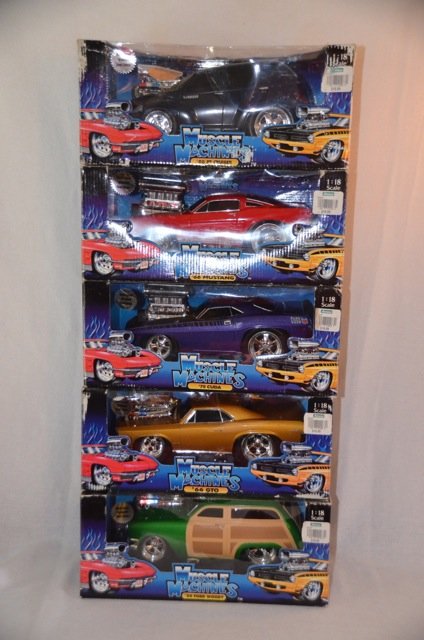 5 Muscle Machine Die Cast Cars 1/18th Scale: 1966 Mustang; 1970 Cuda; 1950 Ford Woody; 1966 GTO; 2000 PT Cruiser. This is the Too Hot Series.