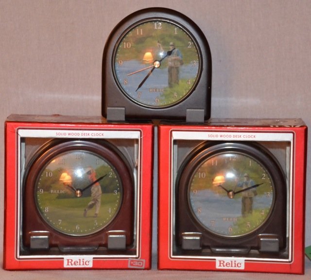 Lot of 3 Relic Sporting Theme Clocks: Two fisherman and a golfer. Two are new in the package. Desk clocks. 5" high