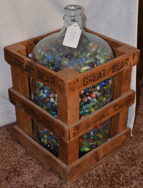 Great Bear Spring Co. with Marbles: Great Bear Spring Company glass water container in wooden crate filled with Marbles.21" high