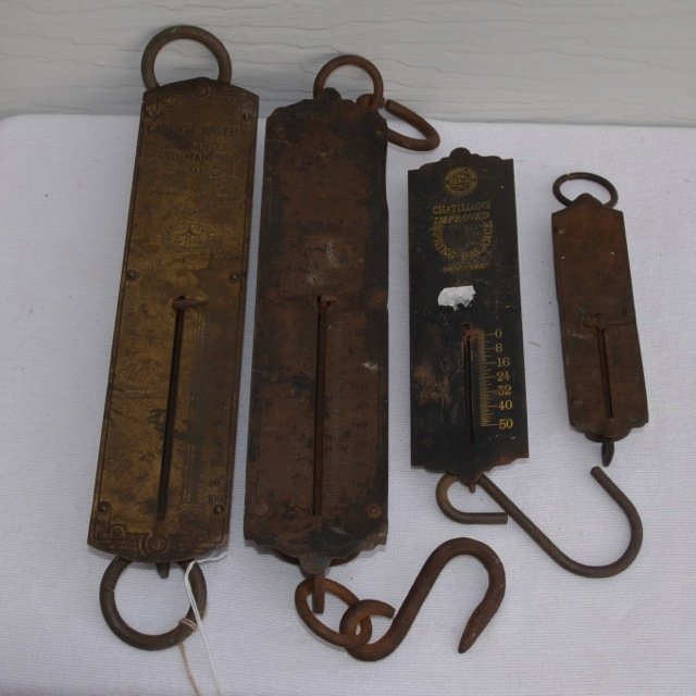 Four Spring Balance Scales: Two are brass faced. Pen Scale Mfg. Co. 100 lbs; Mark Jacobs Bros Co. Inc NY. 100 lbs.; Chatillons Improved Spring Balance 50 lb.; Frary's Improved Spring Balance 24 lb. 12-1/2" long to 6-1/2" long