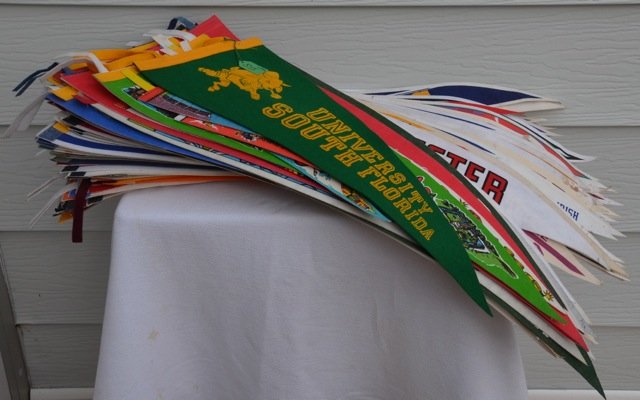 Large Lot of College and Pro Sports Pennants: 100+ Pennants for NFL (Tampa Bay Buckaneers is team signed probably 1978), Collage, a few state and few attractions.