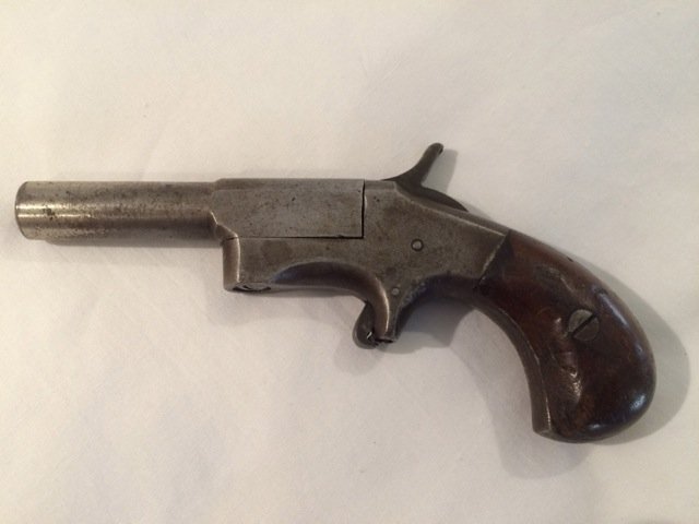 Antique Eclipse Style Single Shot Derringer: .32 Caliber. Circa 1870-1887. Barrel swings to the side for loading. Unmarked. 5-1/2" long