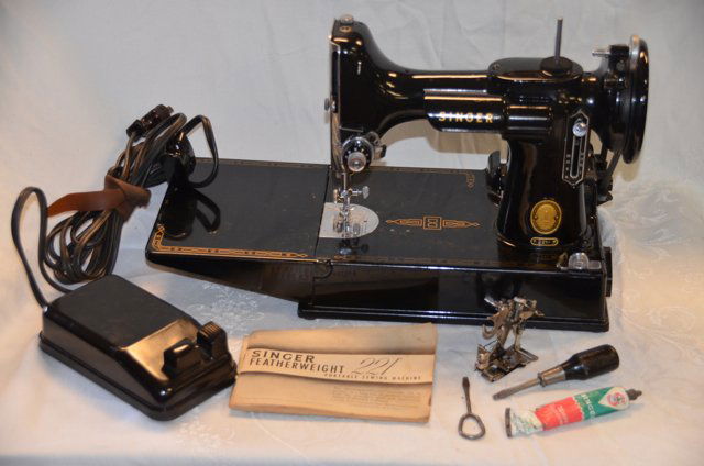 Singer Portable Sewing Machine #221: Singer Featherweight, 1955. In case. Case measurements: 10-3/4" high x 14" w x 8" d