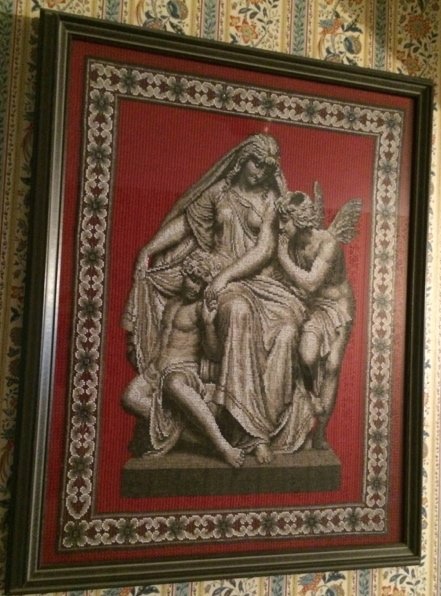 Classical Beadwork Madonna, Child and Angel: Framed Classical beadwork on fabric of a Madonna and Child with an overlooking Angel. Probably Italian. Framed. 25" high x 19" wide