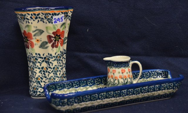 Polish Pottery - Miscellaneous Pieces (3): Tapered floral vase; miniature pitcher; and a corn on the cob dish. 5-1/2" high; 2-1/4" high; and 8-1/4" long.