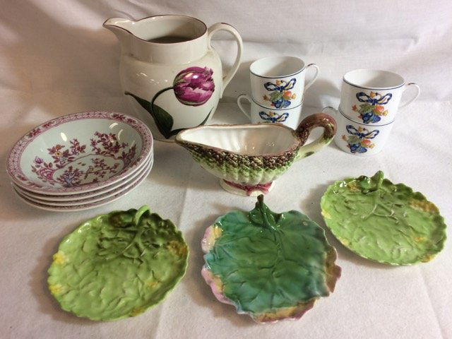 Dealer's Lot of Porcelain Smalls (13): Three Royal Bayreuth nappies; four Bernardaud Limoges Borghese mugs; Johnson Bros bowls; Laura Ashley Botanical pitcher; Asparagas sauce pitcher. Thirteen pieces in all. 2-14" high to 6-1/4" high