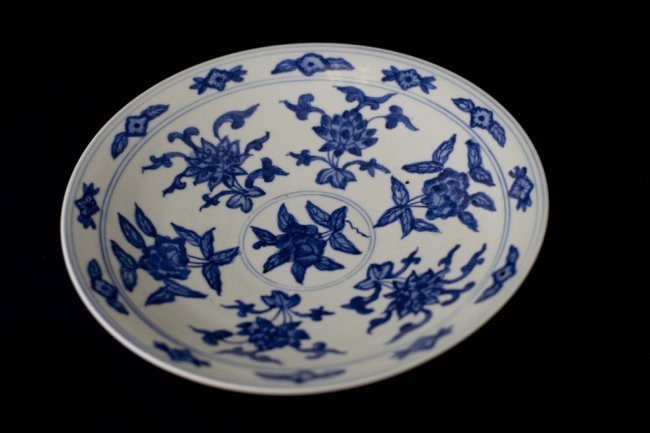 A Blue & White conical shaped bowl: A Blue & White conical shaped bowl bearing Xuande marks to base, painted with foliate sprays. Early 20th Century, D 24cm ( 9.5 in.)