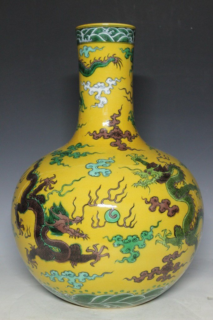 A Yellow Ground Famille Rose Bottle Vase (1 of 10)