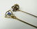 2 piece gold stick pin lot - 2