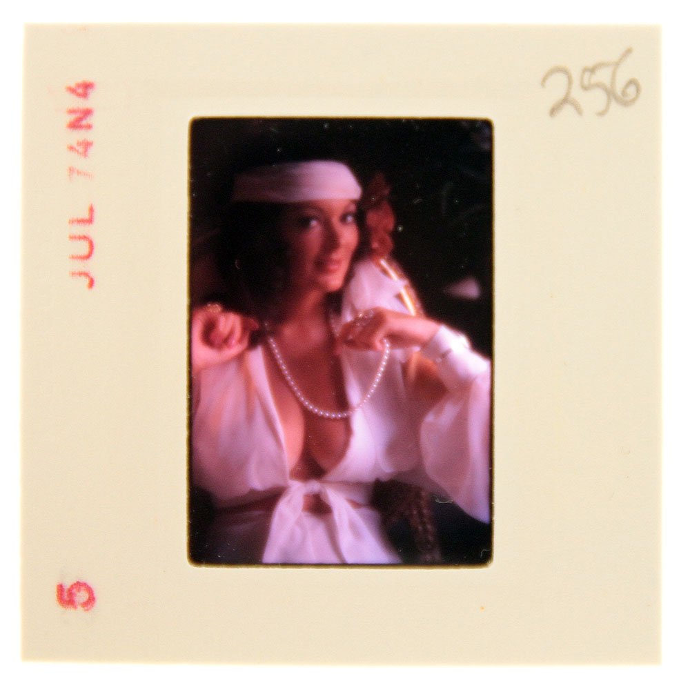Original 35mm Avril Lund 1974 By Bob Guccione: Original nude, erotic, 35mm slide features Avril Lund taken by Bob Guccione in 1974. Print and/or markings on the slide mount are original.