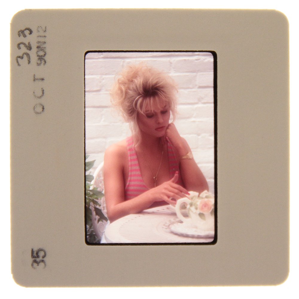 Original 35mm Simone Brigitte 1991 By Bob Guccione: Original nude, erotic, 35mm slide features Simone Brigitte taken by Bob Guccione in 1991. Print and/or markings on the slide mount are original.