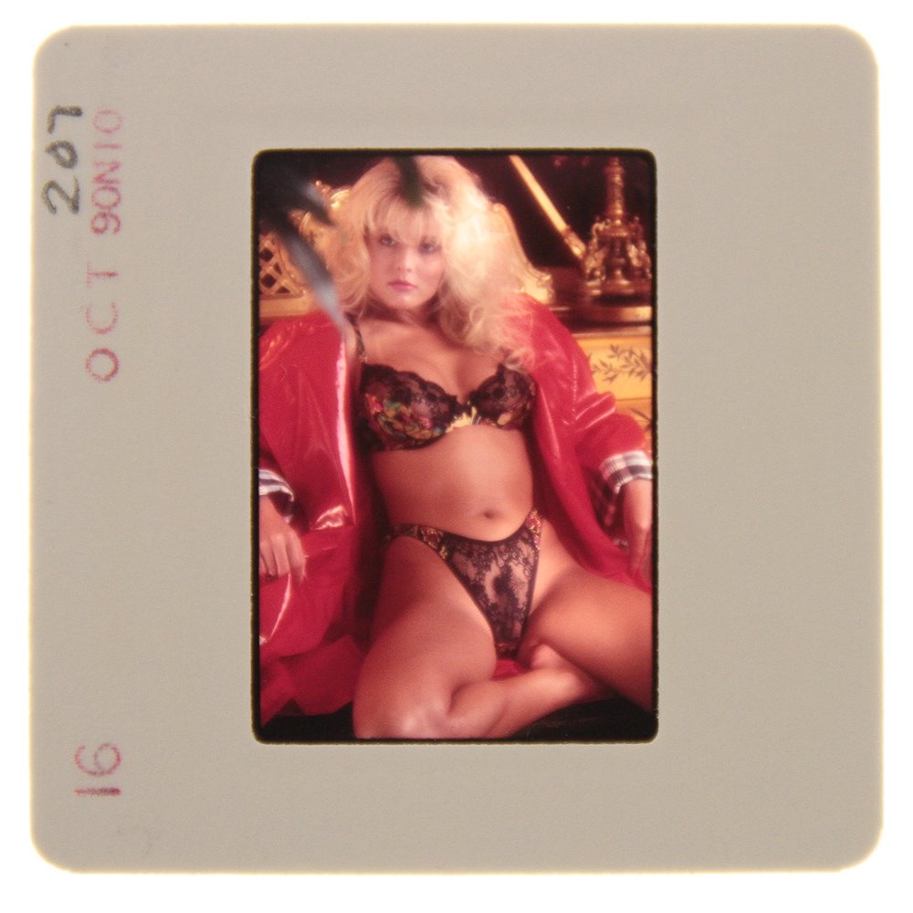 Original 35mm Simone Brigitte 1991 By Bob Guccione: Original nude, erotic, 35mm slide features Simone Brigitte taken by Bob Guccione in 1991. Print and/or markings on the slide mount are original.