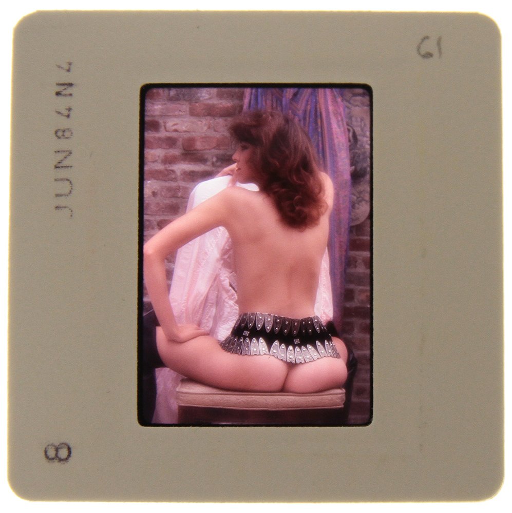 Original 35mm Nina Lee 1984 by Bob Guccione: Original nude, erotic, 35mm slide features "Nina Lee." It was taken by Bob Guccione in 1984. Print and/or markings on the slide mount are original.