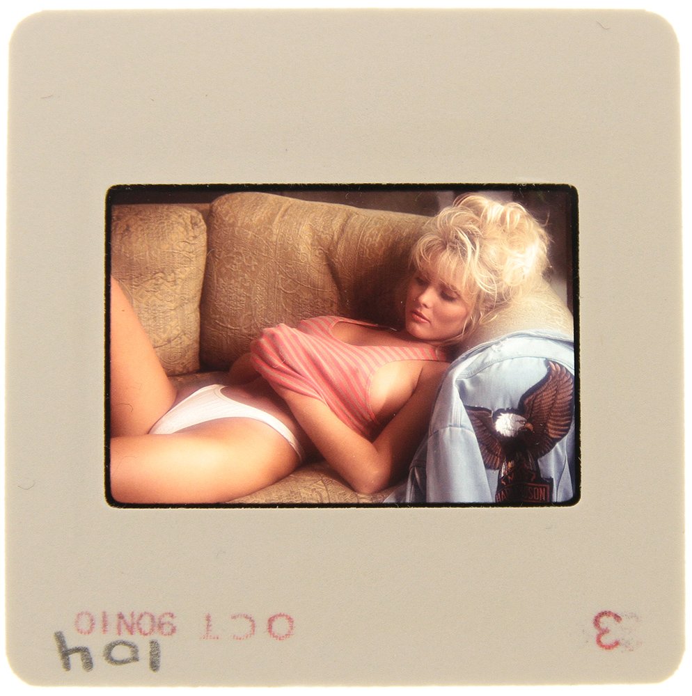 Original 35mm Simone Brigitte 1991 By Bob Guccione: Original nude, erotic, 35mm slide features Simone Brigitte taken by Bob Guccione in 1991. Print and/or markings on the slide mount are original.