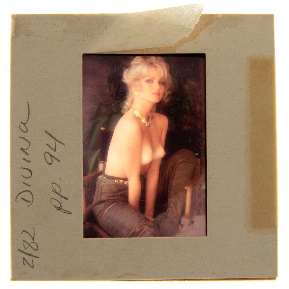 Published Orig 35mm DiVina Celeste 1982 by Bob Guccione: Published original nude, erotic, 35mm slide features DiVina Celeste taken by Bob Guccione in 1982. Print and/or markings on the slide mount are original. This slide was used on page 92 of her Pet of t