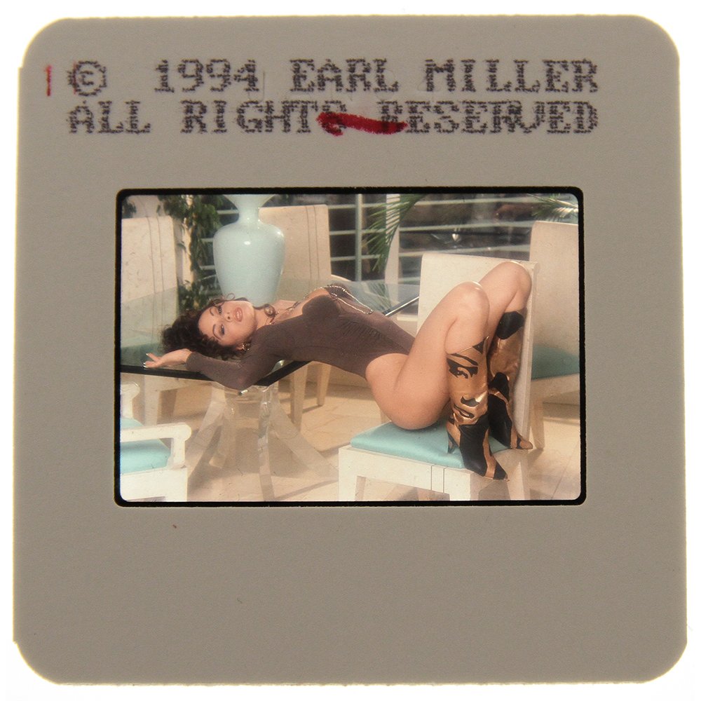 Original 35mm Leslie Glass 1994 By Earl Miller: Original nude, erotic, 35mm slide features Leslie Glass taken by Earl Miller in 1994. Print and/or markings on the slide mount are original.
