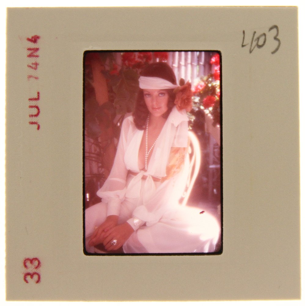 Original 35mm Avril Lund 1974 By Bob Guccione: Original nude, erotic, 35mm slide features Avril Lund taken by Bob Guccione in 1974. Print and/or markings on the slide mount are original.