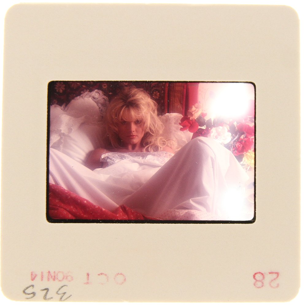 Original 35mm Simone Brigitte 1991 By Bob Guccione: Original nude, erotic, 35mm slide features Simone Brigitte taken by Bob Guccione in 1991. Print and/or markings on the slide mount are original.