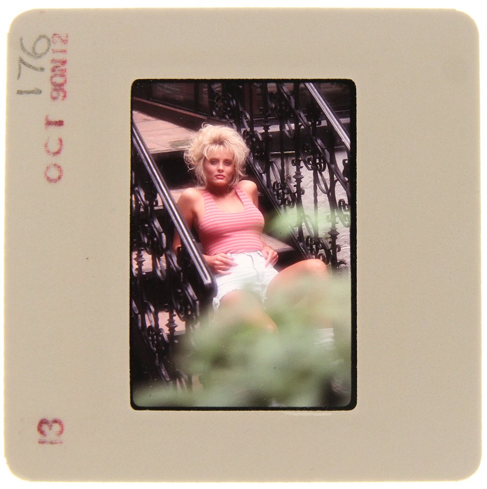Original 35mm Simone Brigitte 1991 By Bob Guccione: Original nude, erotic, 35mm slide features Simone Brigitte taken by Bob Guccione in 1991. Print and/or markings on the slide mount are original.