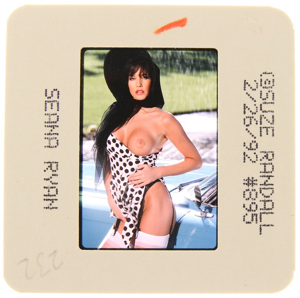 Original 35mm Seana Ryan 1992 By Suze Randall: Original nude, erotic, 35mm slide features Seana Ryan taken by Suze Randall in 1992. Print and/or markings on the slide mount are original.