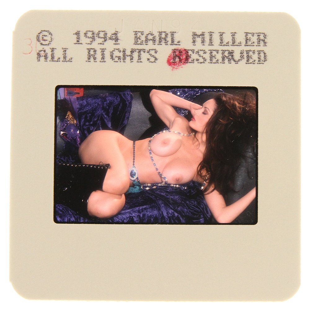 Original 35mm Leslie Glass 1994 By Earl Miller: Original nude, erotic, 35mm slide features Leslie Glass taken by Earl Miller in 1994. Print and/or markings on the slide mount are original.