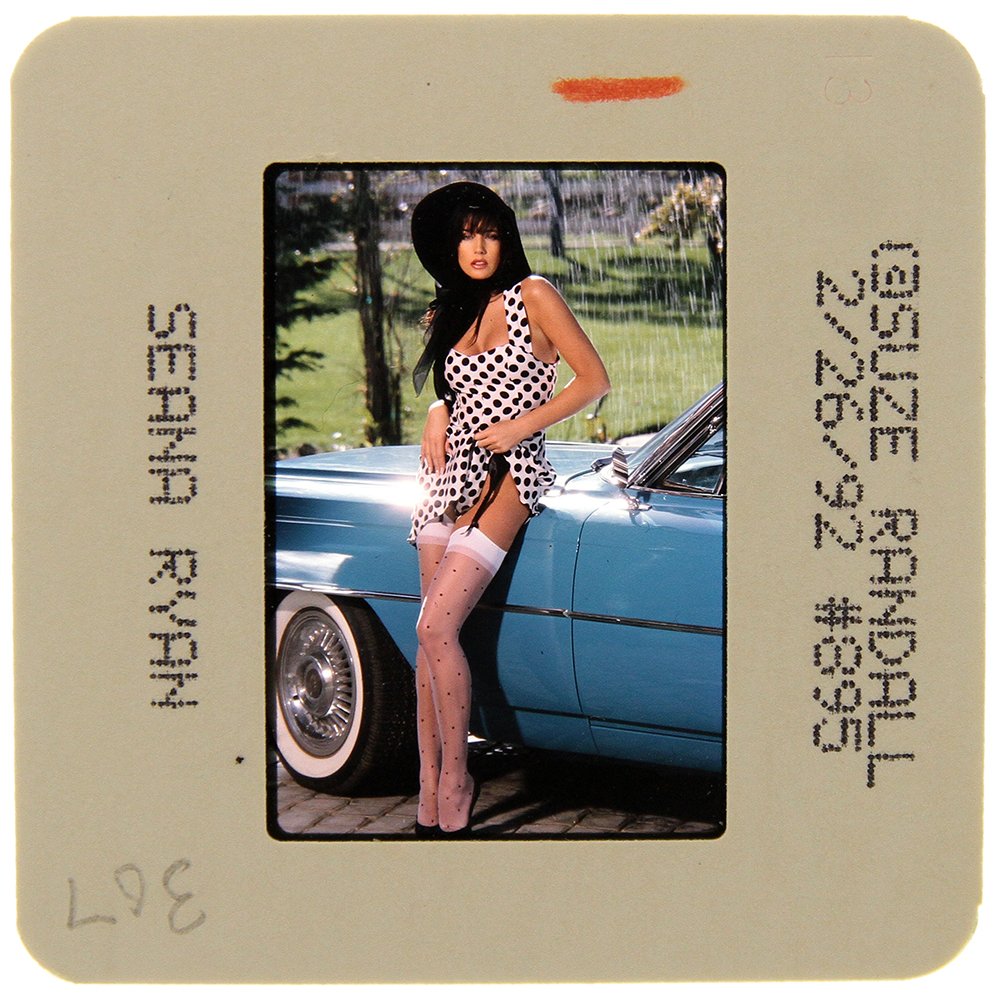 Original 35mm Seana Ryan 1992 By Suze Randall: Original nude, erotic, 35mm slide features Seana Ryan taken by Suze Randall in 1992. Print and/or markings on the slide mount are original.