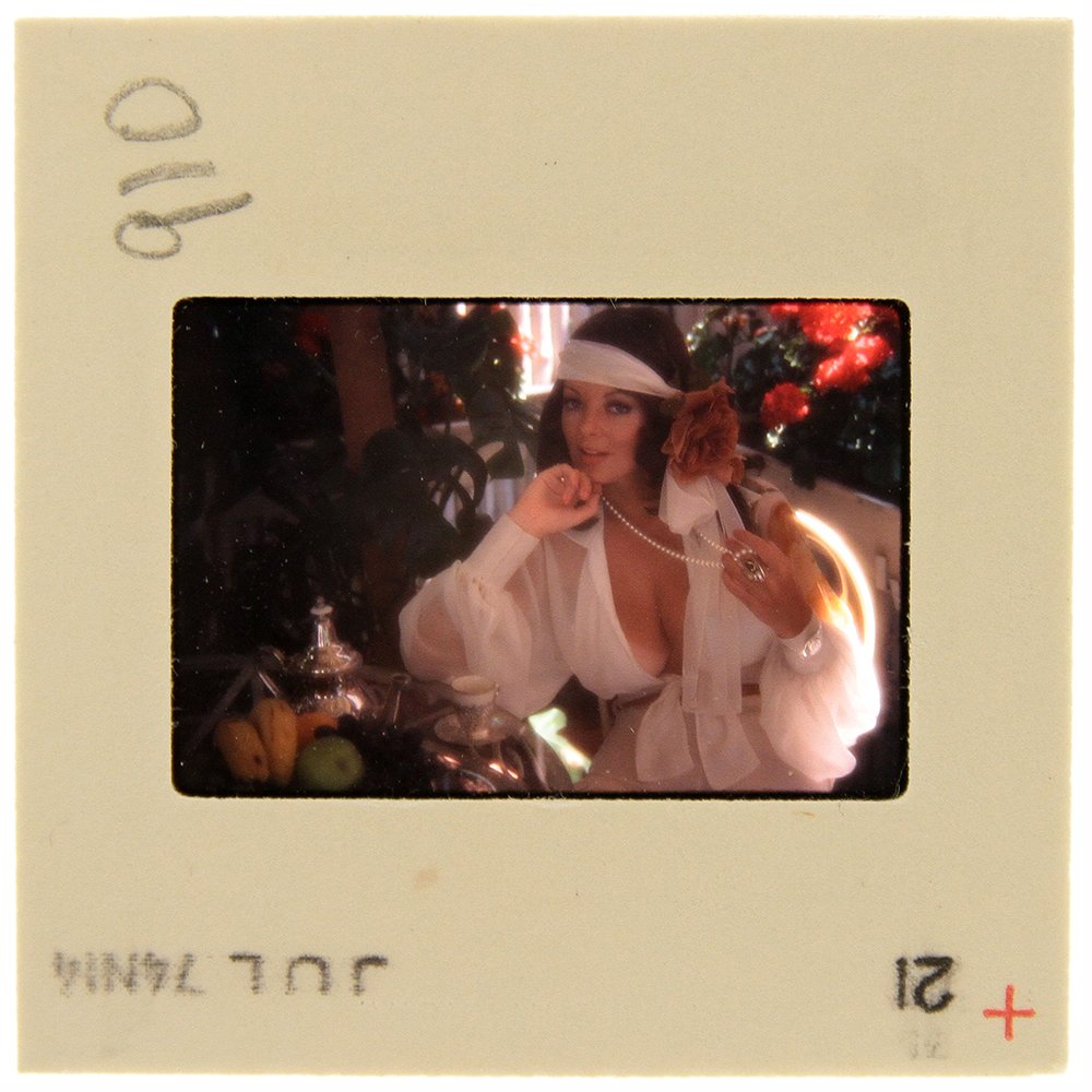 Original 35mm Avril Lund 1974 By Bob Guccione: Original nude, erotic, 35mm slide features Avril Lund taken by Bob Guccione in 1974. Print and/or markings on the slide mount are original.