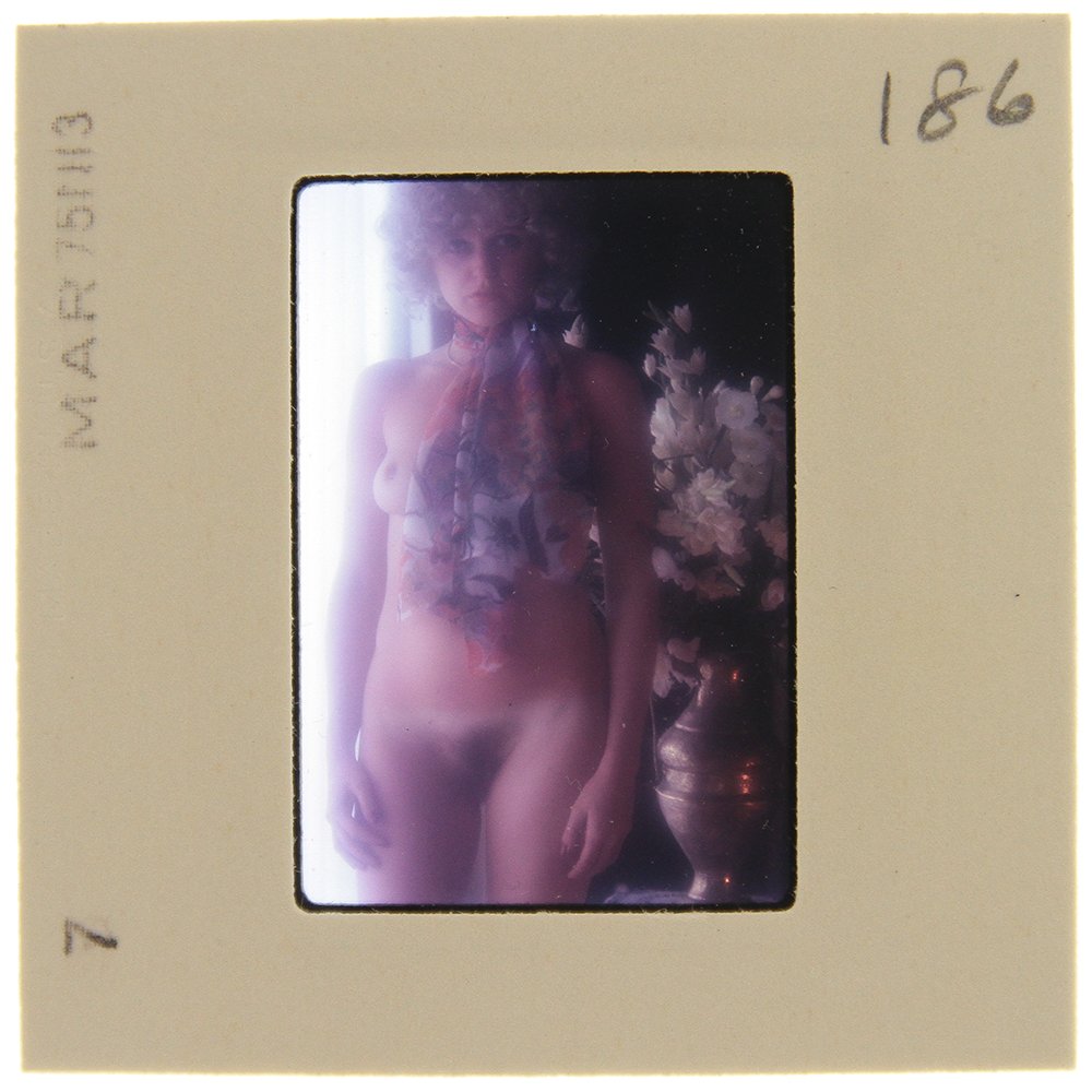 Original 35mm Marguerite Cordier 1975 By Bob Guccione: Original nude, erotic, 35mm slide features Marguerite Cordier taken by Bob Guccione in 1975. Print and/or markings on the slide mount are original.