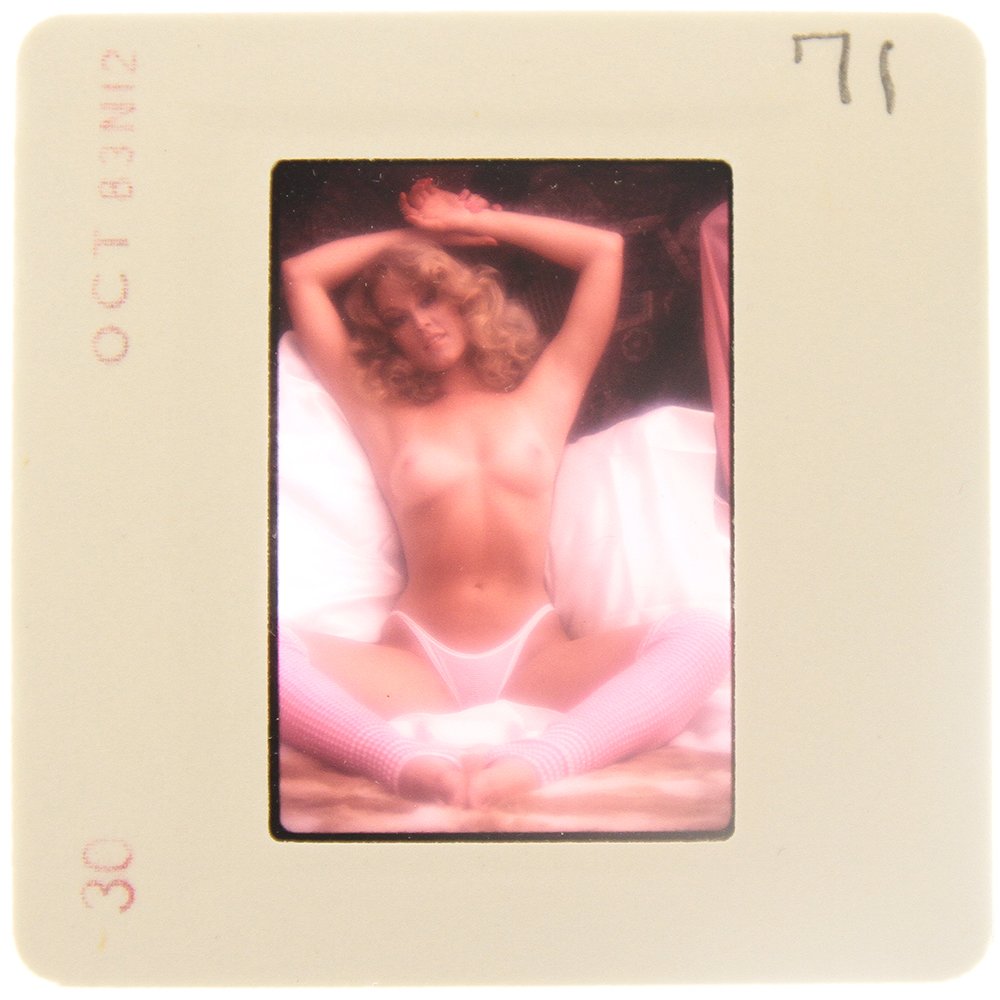Original 35mm Delia Impey 1985 By Bob Guccione: Original nude, erotic, 35mm slide features Delia Impey taken by Bob Guccione in 1985. Print and/or markings on the slide mount are original.