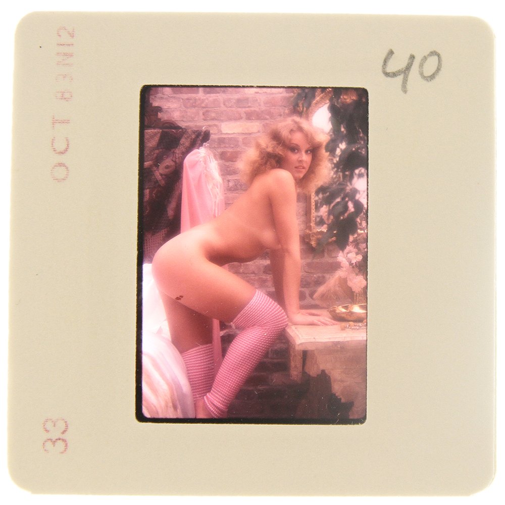 Original 35mm Delia Impey 1985 By Bob Guccione: Original nude, erotic, 35mm slide features Delia Impey taken by Bob Guccione in 1985. Print and/or markings on the slide mount are original.