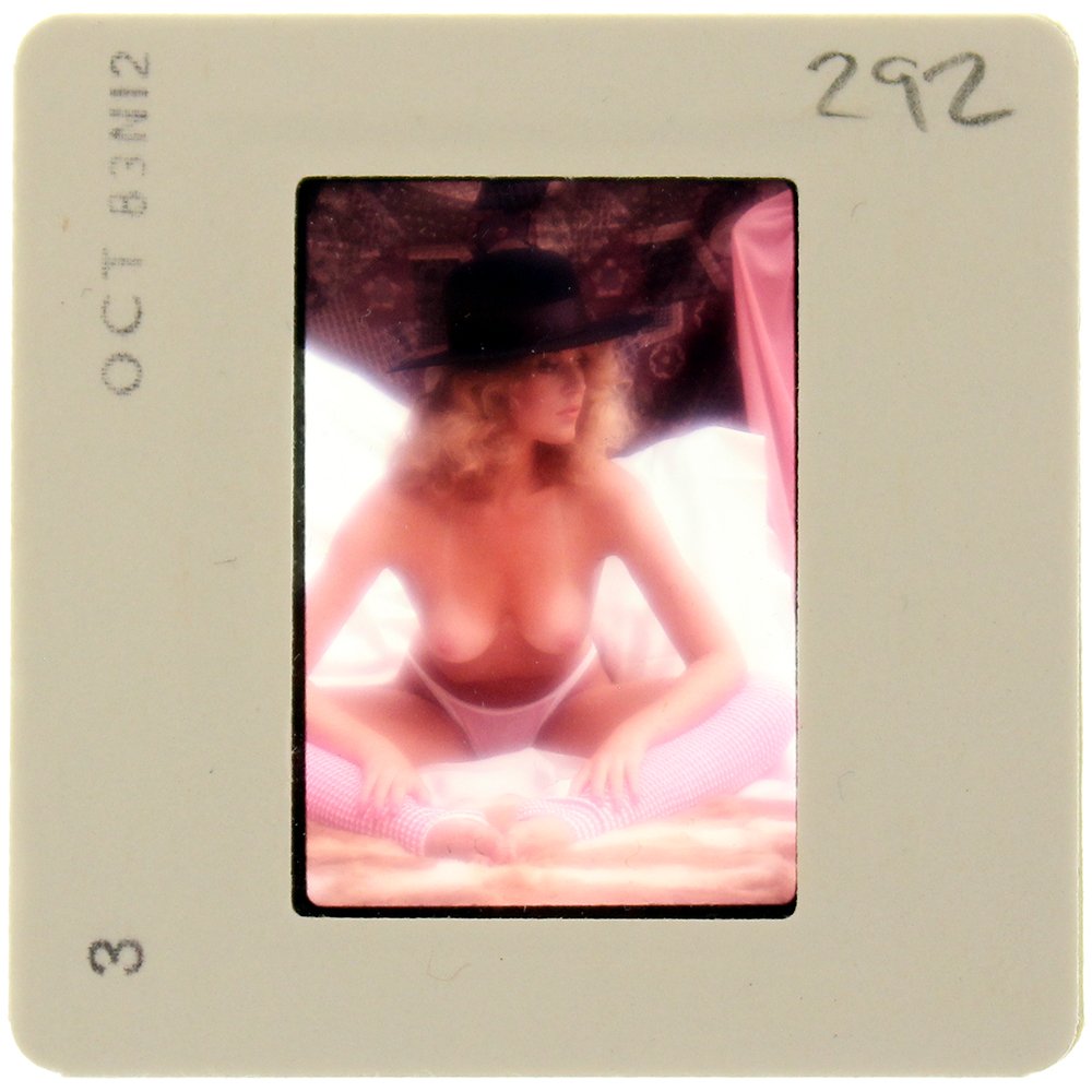 Original 35mm Delia Impey 1985 By Bob Guccione: Original nude, erotic, 35mm slide features Delia Impey taken by Bob Guccione in 1985. Print and/or markings on the slide mount are original.