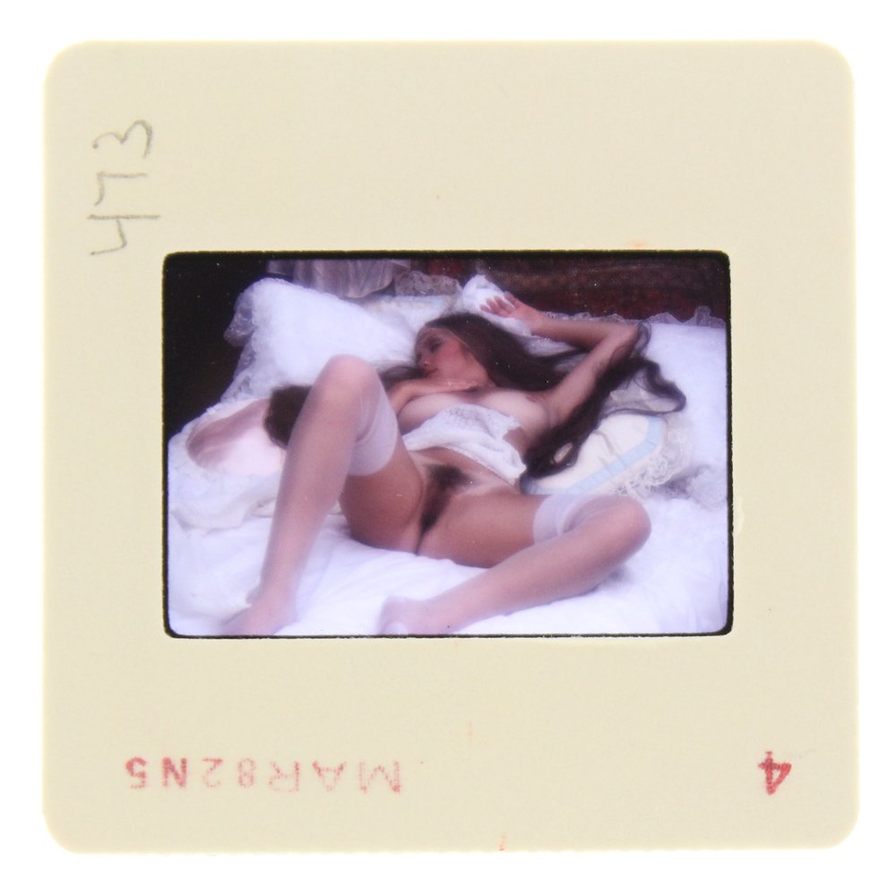 Original 35mm Lari Jones 1982 By Bob Guccione: Original nude, erotic, 35mm slide features Lari Jones taken by Bob Guccione in 1982. Print and/or markings on the slide mount are original. 