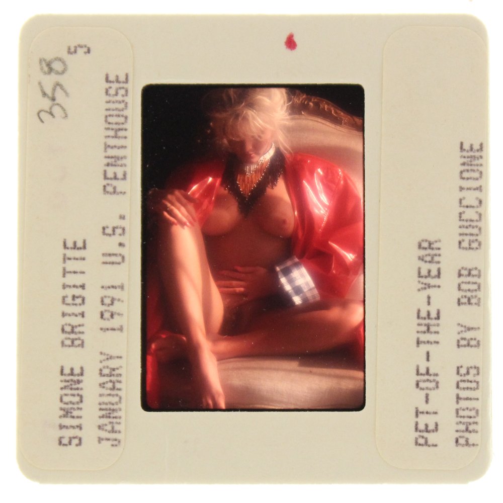 Original 35mm Simone Brigitte 1991 By Bob Guccione: Original nude, erotic, 35mm slide features Simone Brigitte taken by Bob Guccione in 1991. Print and/or markings on the slide mount are original.