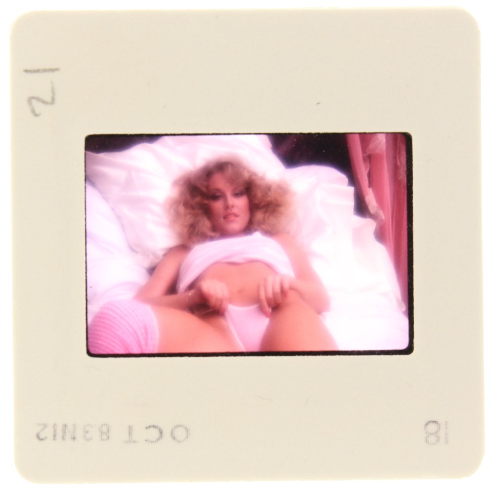 Original 35mm Delia Impey 1985 By Bob Guccione: Original nude, erotic, 35mm slide features Delia Impey taken by Bob Guccione in 1985. Print and/or markings on the slide mount are original.