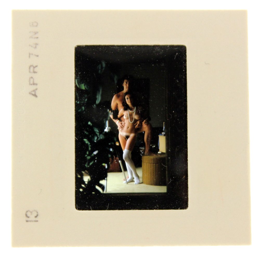 Original 35mm Lavinia Douglas 1974 by Bob Guccione: Original nude, erotic, 35mm slide features Lavinia Douglas taken by Bob Guccione in 1974. Print and/or markings on the slide mount are original.