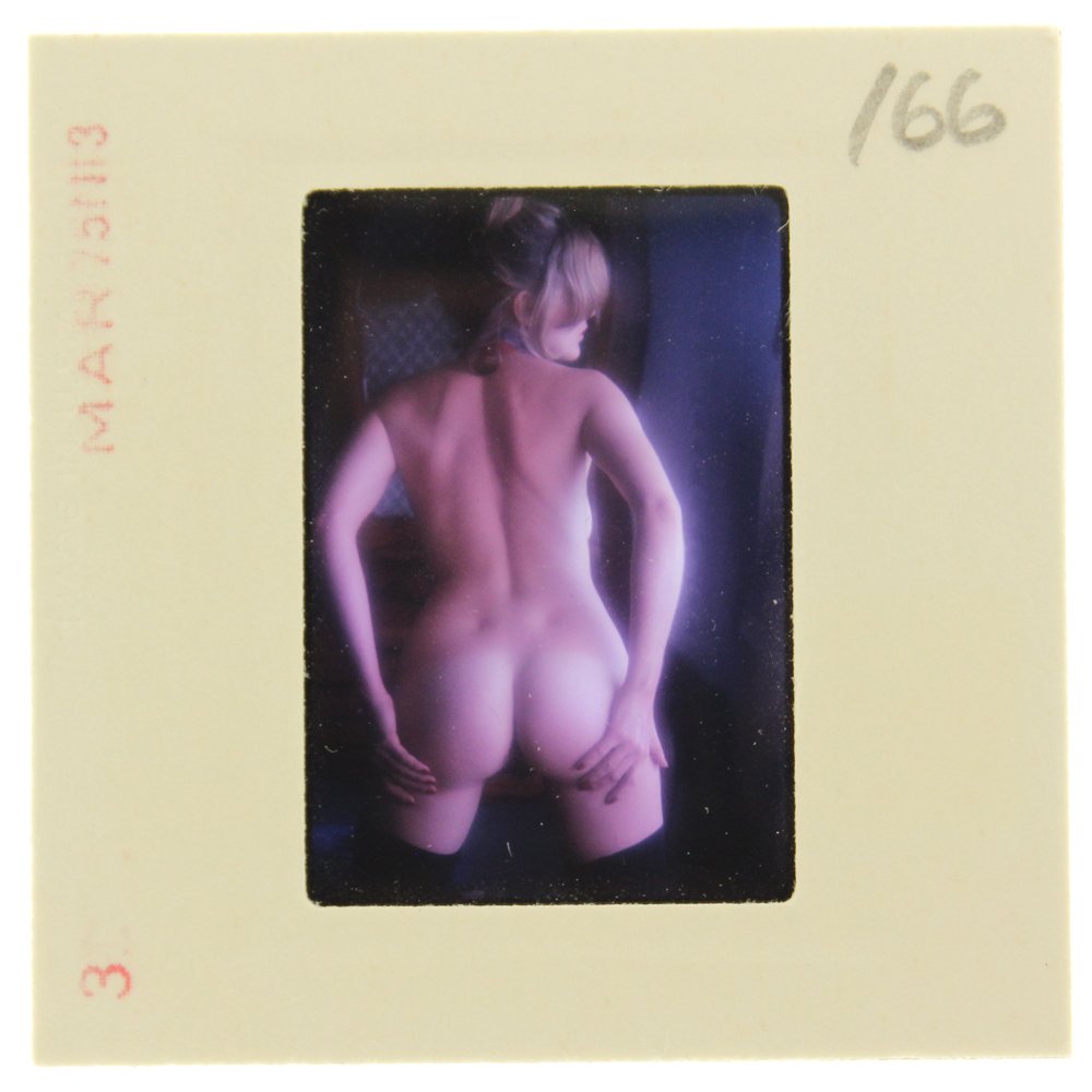 Original 35mm Marguerite Cordier 1975 By Bob Guccione: Original nude, erotic, 35mm slide features Marguerite Cordier taken by Bob Guccione in 1975. Print and/or markings on the slide mount are original.