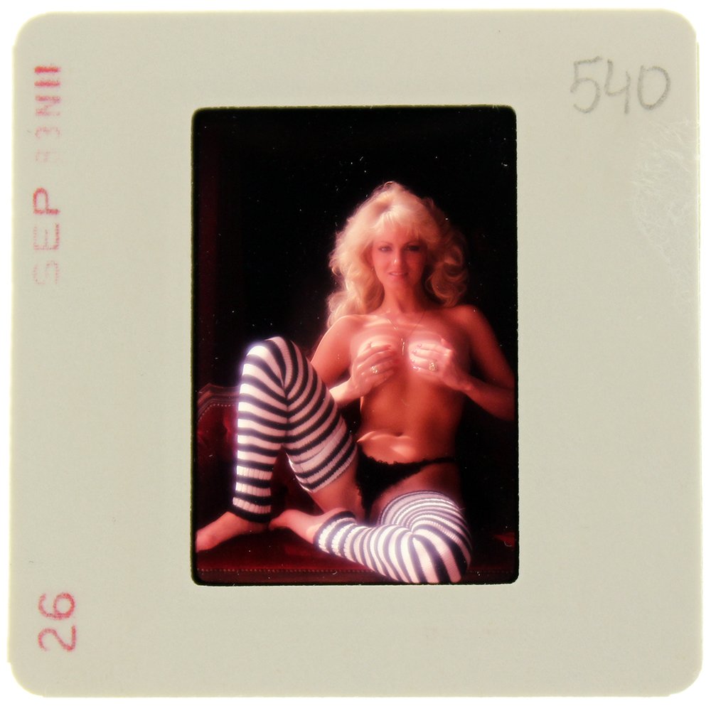 Original 35mm DiVina Celeste 1983 by Bob Guccione: Original nude, erotic, 35mm slide features DiVina Celeste taken by Bob Guccione in 1983. Print and/or markings on the slide mount are original.
