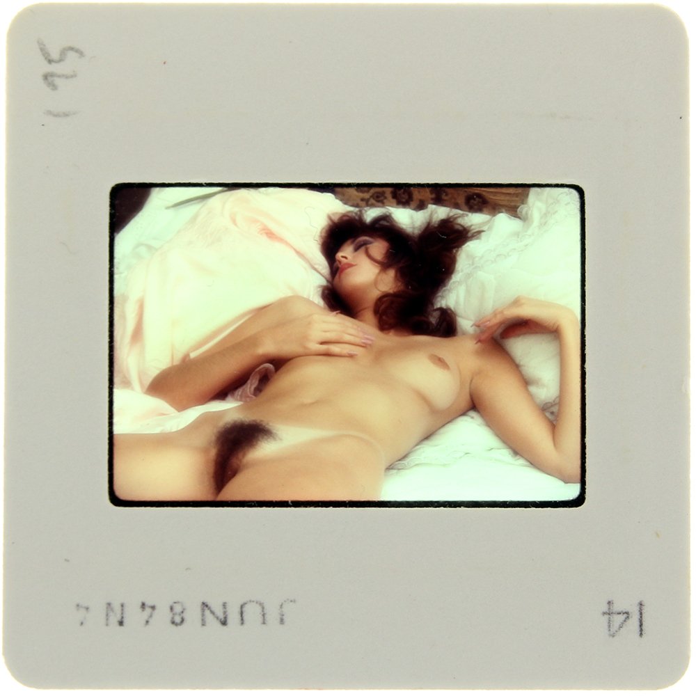 Original 35mm Nina Lee 1984 by Bob Guccione: Original nude, erotic, 35mm slide features "Nina Lee." It was taken by Bob Guccione in 1984. Print and/or markings on the slide mount are original.