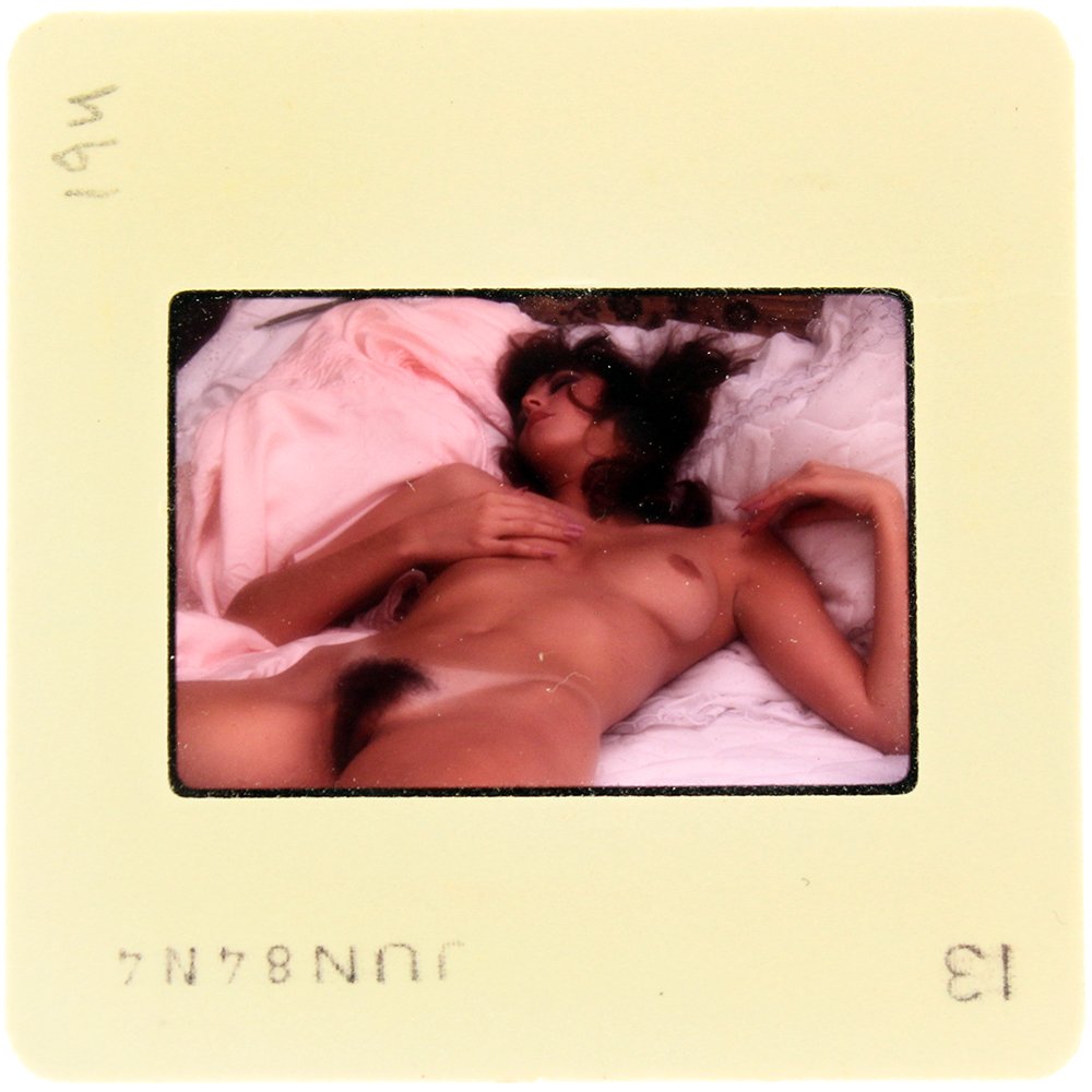 Nina Lee 1984 35mm By Bob Guccione: Original 35mm slide features "Nina Lee." It was taken by Bob Guccione in 1984. Print and/or markings on the slide mount are original.