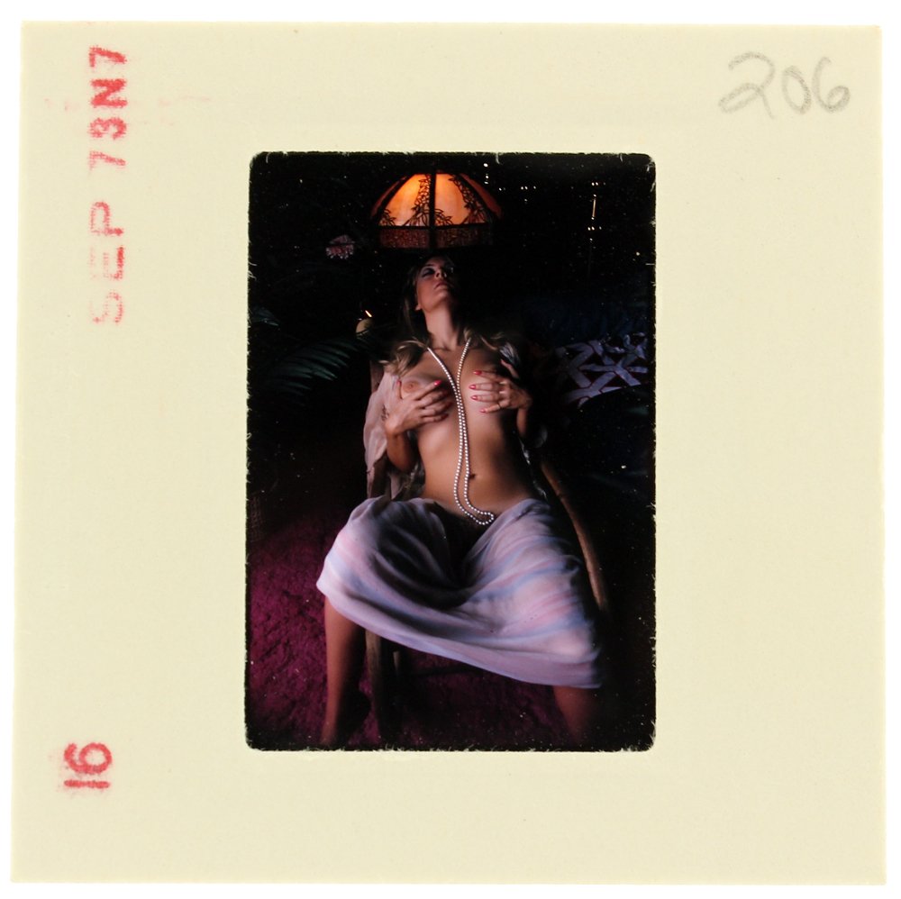 Suzanna Hayes 1973 35mm By Bob Guccione: Original nude, erotic, 35mm slide features Suzanna Hayes taken by Bob Guccione in 1973. Print and/or markings on the slide mount are original.
