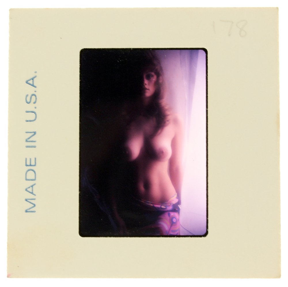 Susan Waide 1975 35mm By Bob Guccione: Original nude, erotic, 35mm slide features Suzan Waide taken by Bob Guccione in 1975. Print and/or markings on the slide mount are original.
