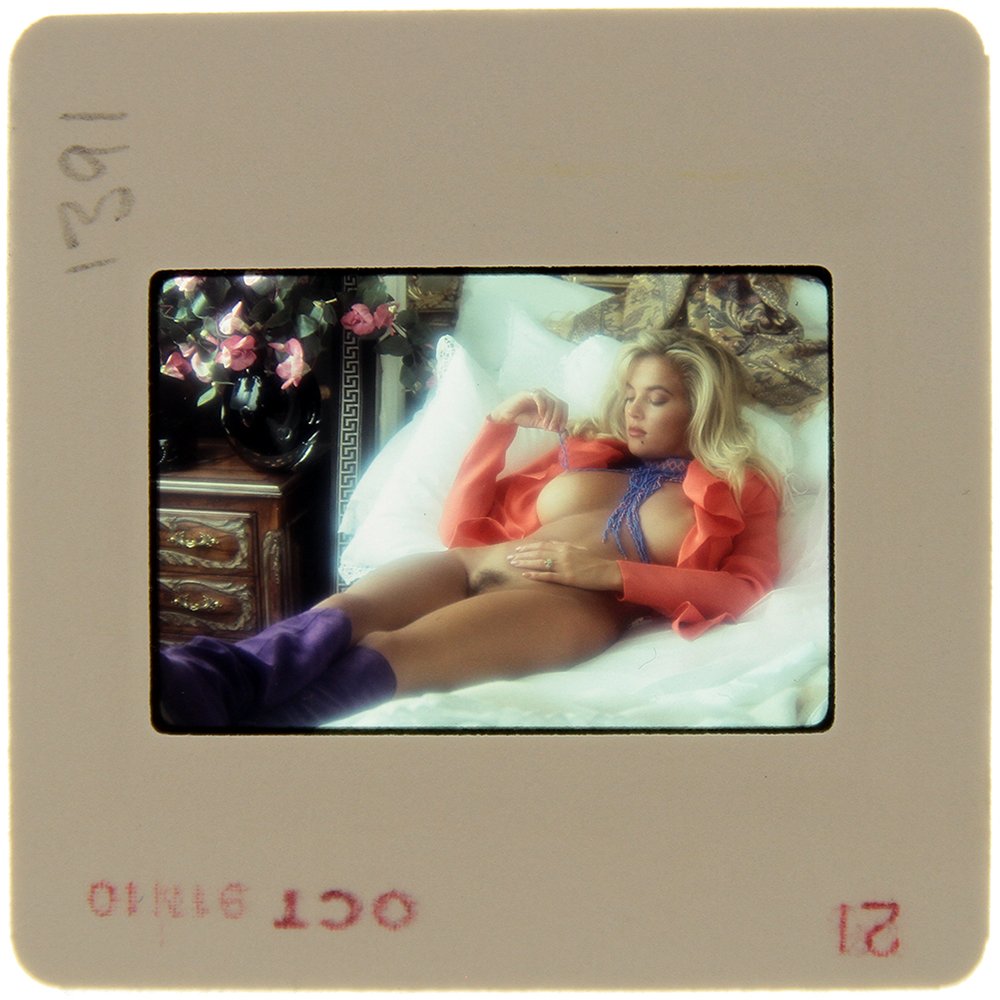 Brandy Ledford 35mm 1991 By Bob Guccione: Original nude, erotic, 35mm slide features Brandy Ledford taken by Bob Guccione in 1991. Print and/or markings on the slide mount are original.