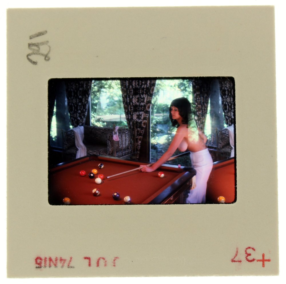 Avril Lund 1974 35mm By Bob Guccione: Original nude, erotic, 35mm slide features Avril Lund taken by Bob Guccione in 1974. Print and/or markings on the slide mount are original.