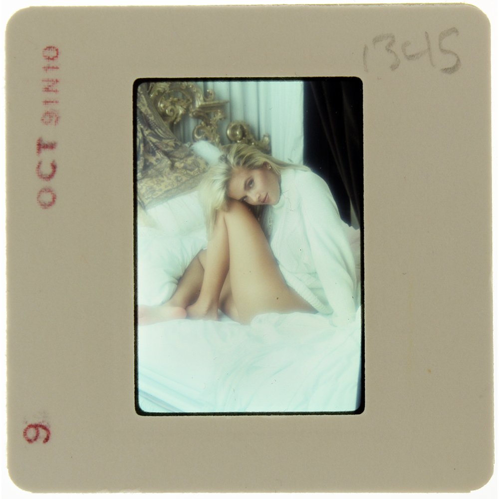 Brandy Ledford 1991 35mm By Bob Guccione: Original nude, erotic, 35mm slide features Brandy Ledford taken by Bob Guccione in 1991. Print and/or markings on the slide mount are original.