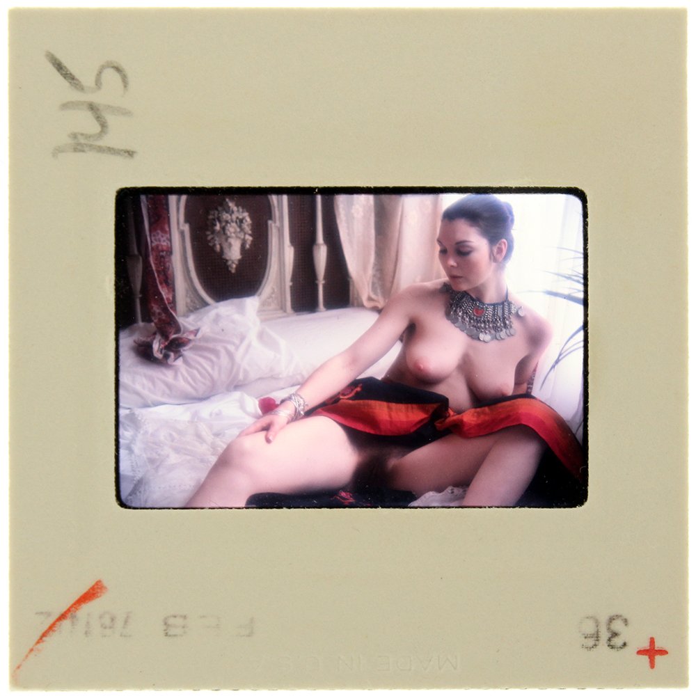 Anna Grimwood 1976 35mm By Bob Guccione: Original nude, erotic, 35mm slide features Anna Grimwood taken by Bob Guccione in 1976. Print and/or markings on the slide mount are original.