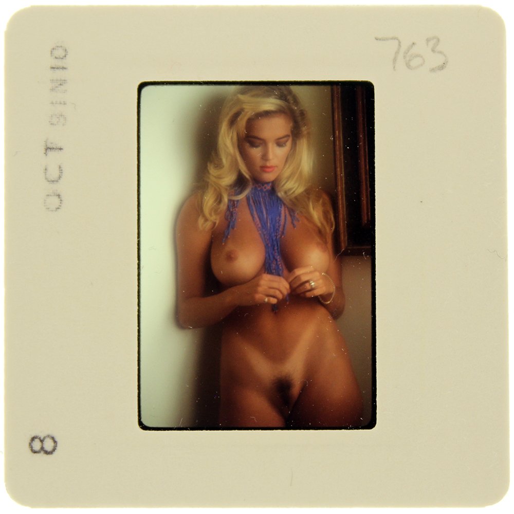 Brandy Ledford 1991 35mm By Bob Guccione: Original nude, erotic, 35mm slide features Brandy Ledford taken by Bob Guccione in 1991. Print and/or markings on the slide mount are original.