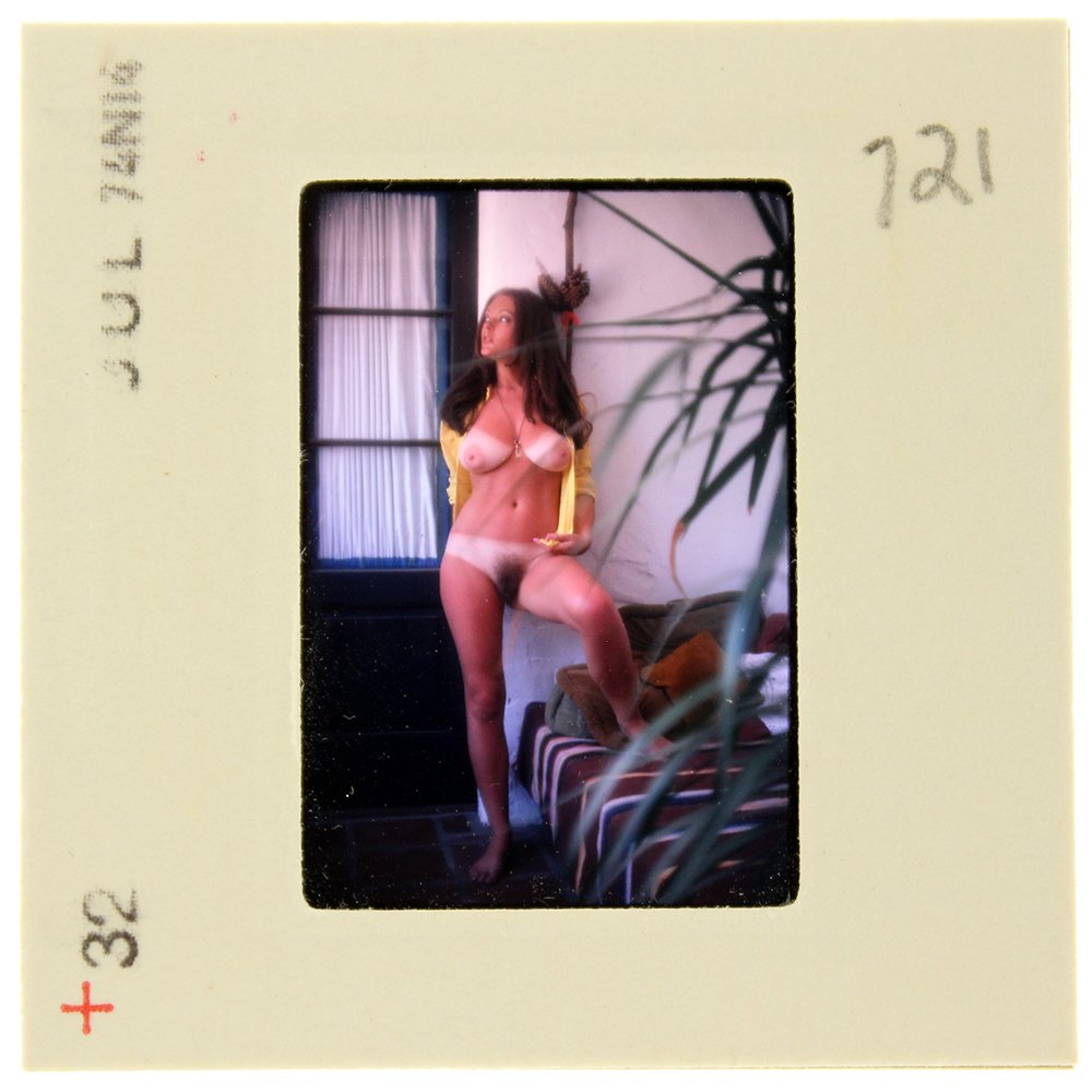 Avril Lund 1974 35mm By Bob Guccione: Original nude, erotic, 35mm slide features Avril Lund taken by Bob Guccione in 1974. Print and/or markings on the slide mount are original.