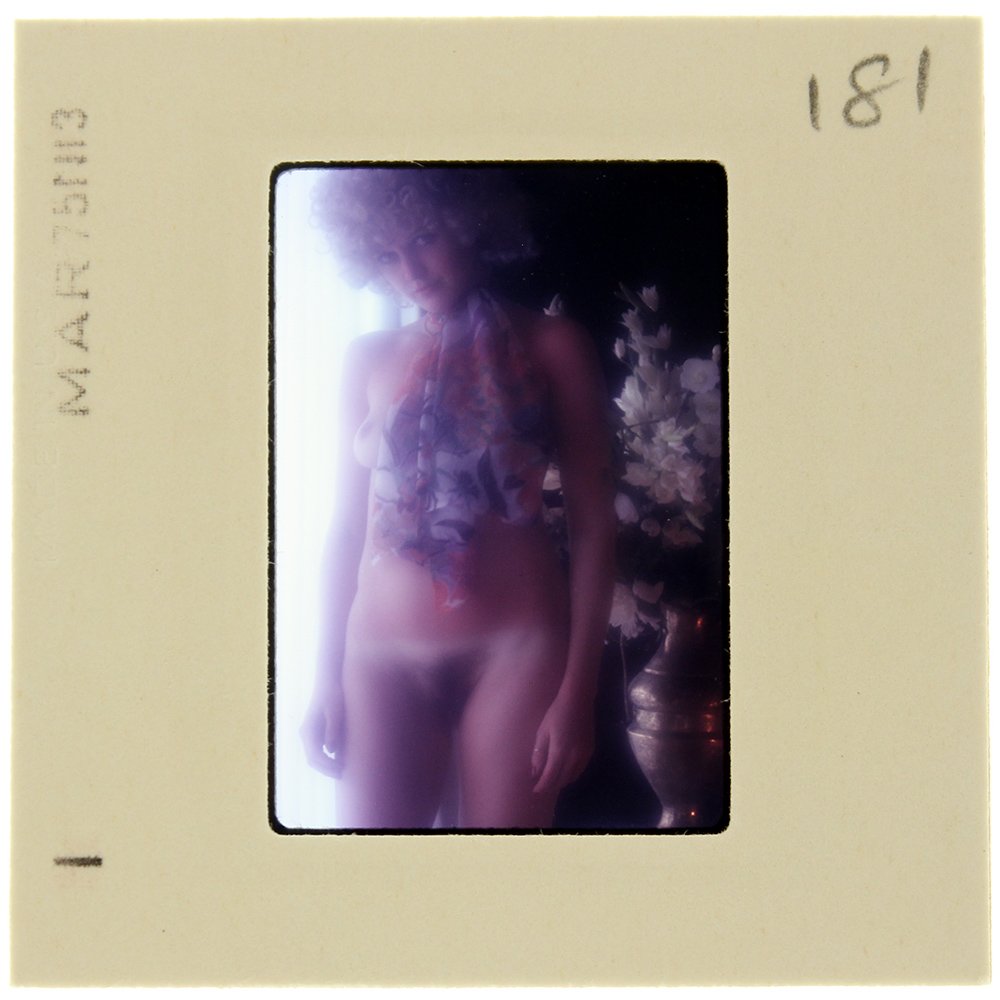 Marguerite Corider 1975 35mm By Bob Guccione: Original 35mm slide features Marguerite Cordier taken by Bob Guccione in 1975. Print and/or markings on the slide mount are original.