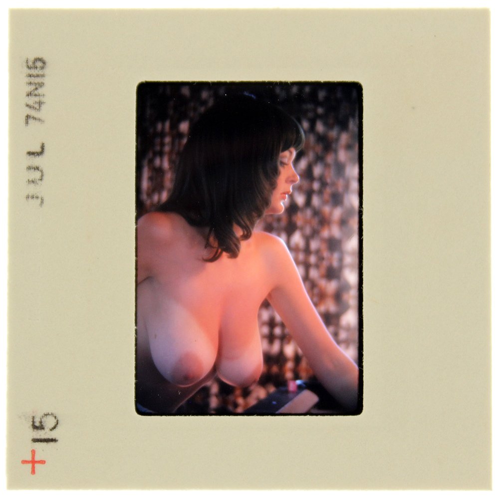 Avril Lund 1974 35mm By Bob Guccione: Original 35mm slide features Avril Lund taken by Bob Guccione in 1974. Print and/or markings on the slide mount are original. Mod