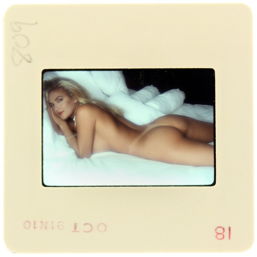 Brandy Ledford 1991 35mm By Bob Guccione: Original nude, erotic, 35mm slide features Brandy Ledford taken by Bob Guccione in 1991. Print and/or markings on the slide mount are original.